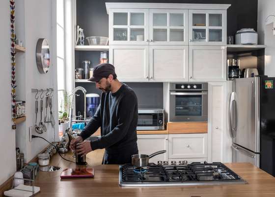 Luis San Martin in his La Mascota kitchen