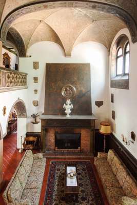 View of the parlour room with its grand fireplace