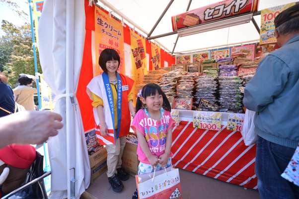 Young visitor stocking up on sweets