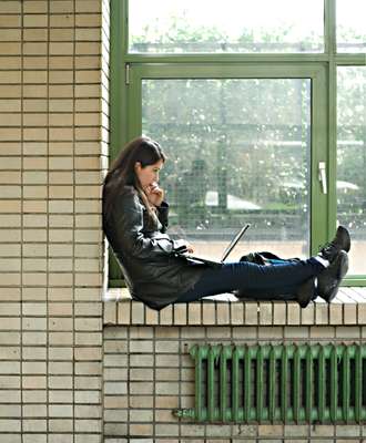 A student finds a quiet spot to do some work