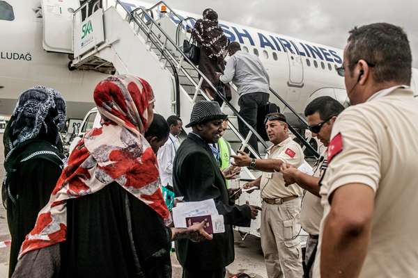 Somalis boarding a Turkish Airlines flight to Istanbul 