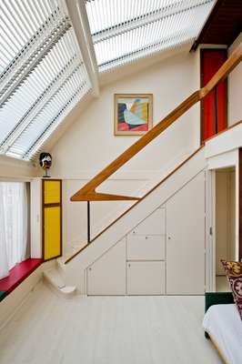 Mahogany staircase with wrought-iron base, designed by Janette Laverrière