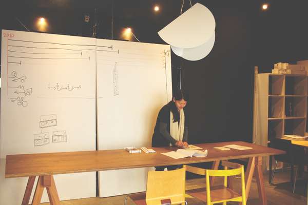 Staff member in basement workshop