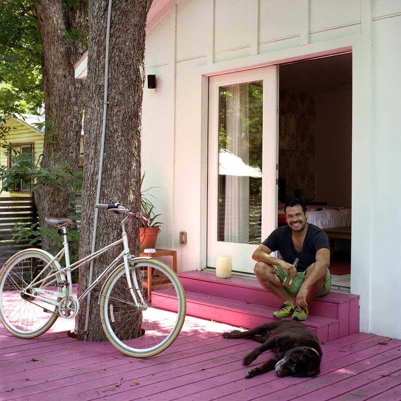 Alan Gonzalez and his dog Taco at home