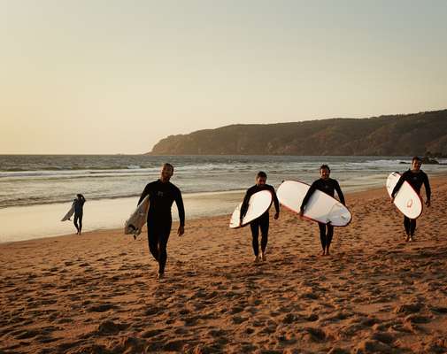 Surfers on Guincho Beach