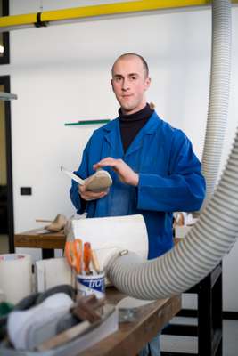 Trainee Lorenzo Angeletti learns how to make wooden shoe lasts at Formificio Veregra