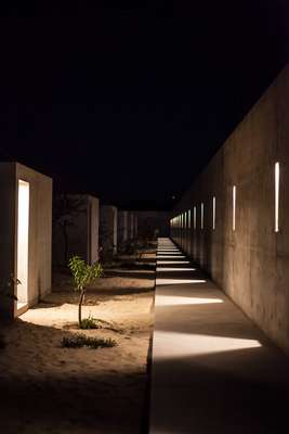 Beach cabanas at night