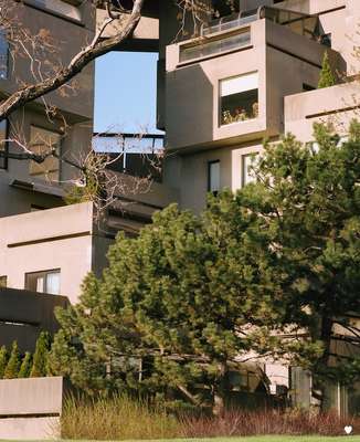 The architecture offers cut out views between the cubes 