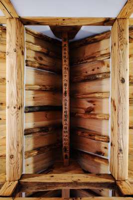 Wooden ceiling beam marking completion of Fouser's project