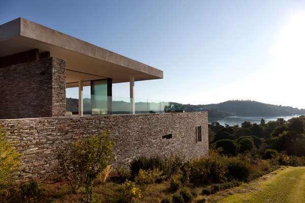 Side view of the house and slate wall