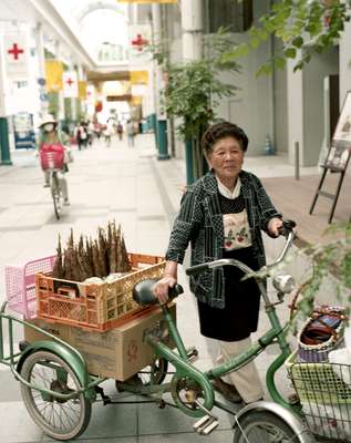 Woman selling bamboo shoots
