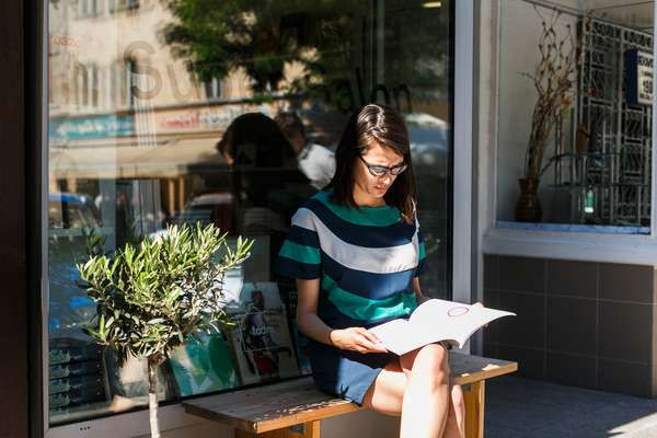 Quiet moment outside bookshop Super Salon