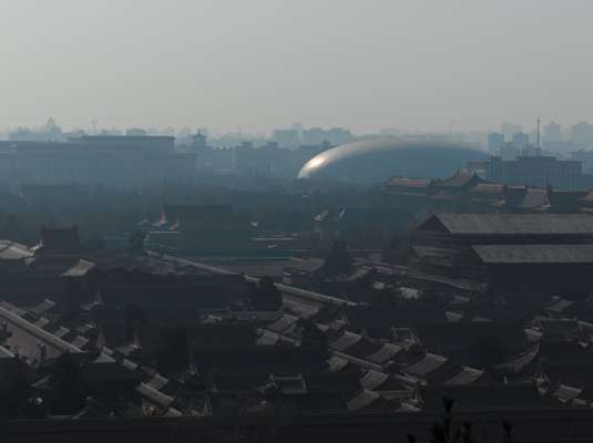 Paul Andreu’s National Centre for the Performing Arts seen over the rooftops of the Forbidden City
