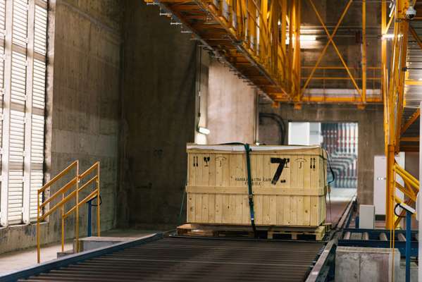 Cargo enters the container handling system 