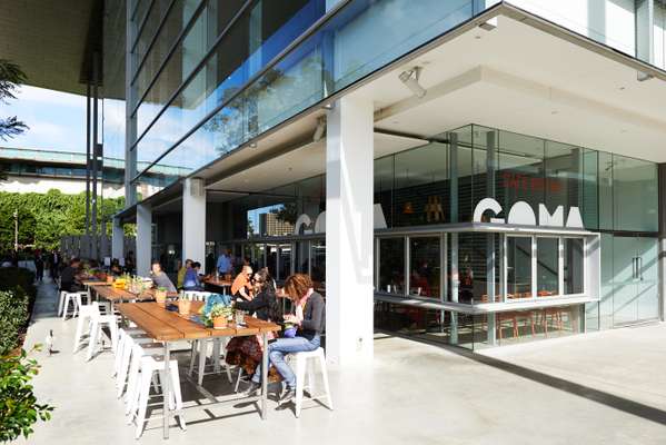 Patrons enjoying books and views of the river