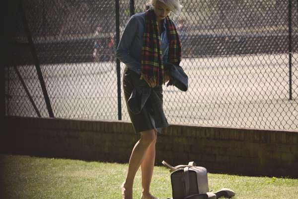 jacket by Drawer, scarf by Sophnet., shirt by Oliver Spencer, bag by Valextra, skirt by Oscar de la Renta, shoes by Sergio Rossi, watch by Hermès, necklace by Cartier