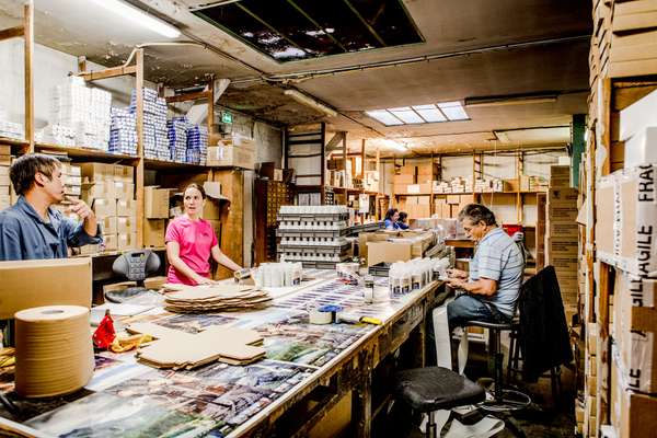 Some of the team working in the packaging area of the factory