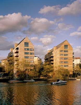 Residents dock their boats outside