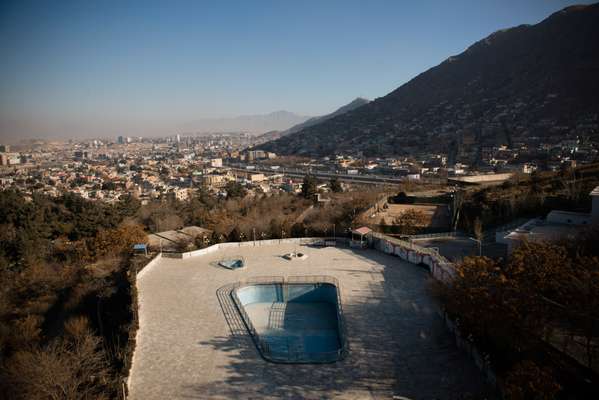 View of Kabul from the fifth floor. The pool and tennis court remain empty