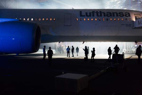 Guests and staff inspect Lufthansa’s new A350 in the hangar