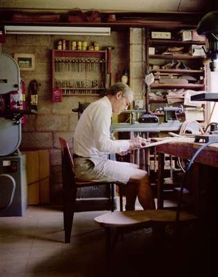 John Yarnall works in the chair shop 