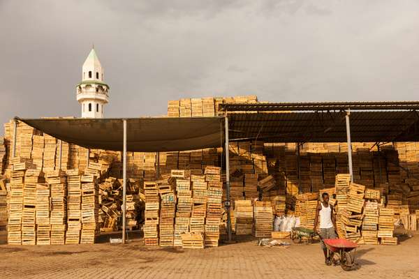 Empty transport crates piled up in Riyad Market indicate how vital imported produce is to life in Djibouti 