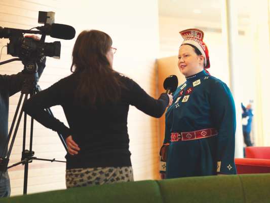 Tiina Sanila-Aikio, member of the Finnish Sámi parliament, being interviewed