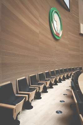 Plenary hall with African Union crest mounted on wall