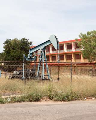 A pumpjack extracts oil from Cabimas, a town on the shore of Lake Maracaibo