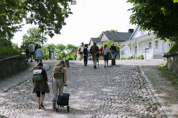 Tourists explore the town