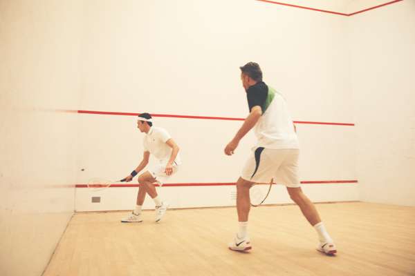 Ben wears black, green and white t-shirt by Dunlop, shorts by Lotto, wristband and shoes by Nike, racquet by Wilson, drinks bottle by Asics. Chay wears white headband and blue wristband by Asics, polo shirt by Nike, shorts by Fred Perry, shoes and racquet by Wilson