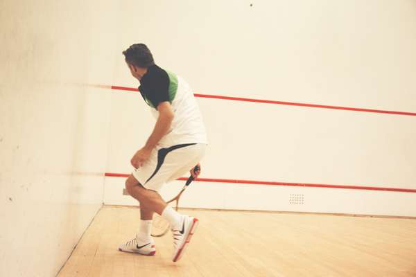 Ben wears black, green and white t-shirt by Dunlop, shorts by Lotto, wristband and shoes by Nike, racquet by Wilson, drinks bottle by Asics