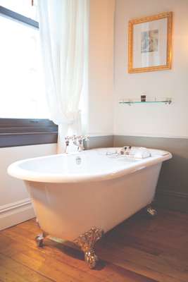 Freestanding bath in one of the bedrooms