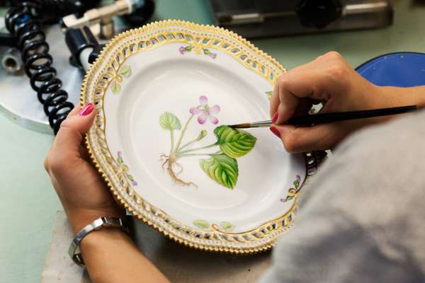 Handpainting a dinner plate