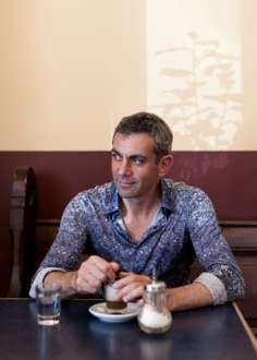 Wladimir Kaminer in Café Meta, near his Berlin apartment