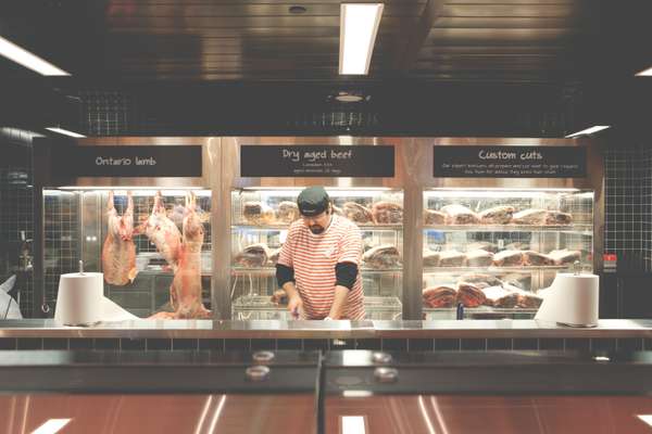 Even a butcher can look friendly and approachable in a striped t-shirt