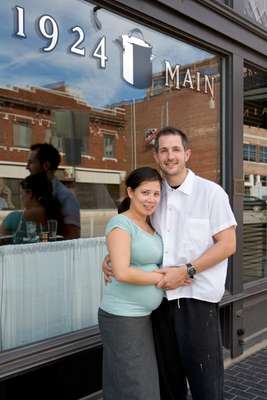 The Dalzells in front of their restaurant