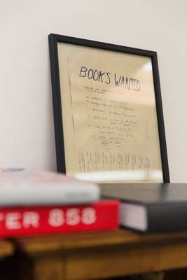 Artwork by Derek Sullivan sits in Ruscha's library