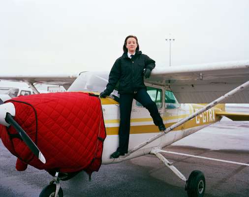 Alexandra Owen, one of Moncton’s 15 female students next to a Cessna 