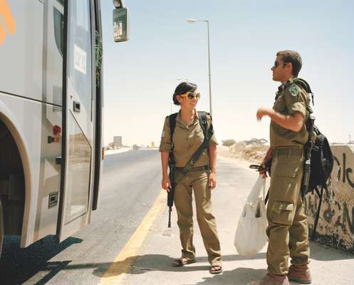 IDF conscripts boarding a bus in Negev desert 