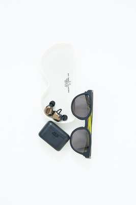 Sunglasses by Eyevol,  glasses dish by Puebco, earphones by Nuarl 