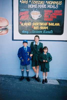 School children outside a Greek cornershop