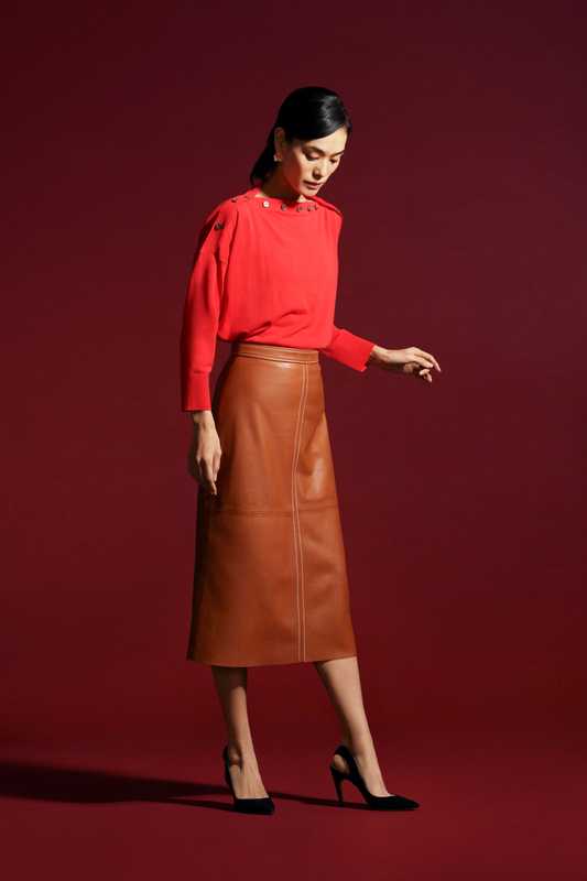 Top by J.Crew, skirt by Vanessa Seward, shoes by Christian Dior, earrings by Sarah & Sebastian