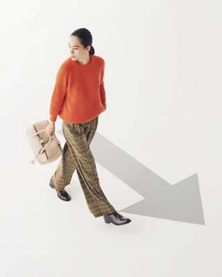 Jumper by Asciari, trousers by PT Pantaloni Torino, shoes by Fratelli Rossetti, bracelet and ring by Shihara, bag by Golden Goose Deluxe Brand