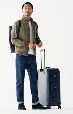 Jacket by Valstar, polo shirt by Altea, jeans by Brooksfield, shoes by Clarks from Beams, suitcase by Zero Halliburton, backpack by Aeta X MoonStar, passport case  by Porter 