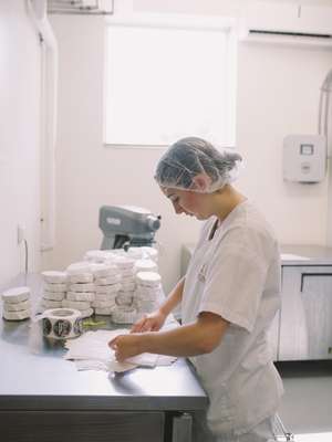 Packaging cheese at the Fifth Town Artisan Cheese Co 