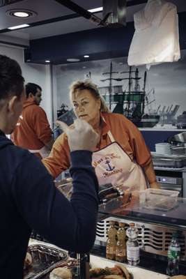 Regina selling Fischbrötchen (fish rolls) at the Marx & Sohn stall