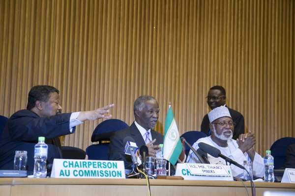Chairperson of the AU Jean Ping (left) sits next to South Africa’s Thabo Mbeki