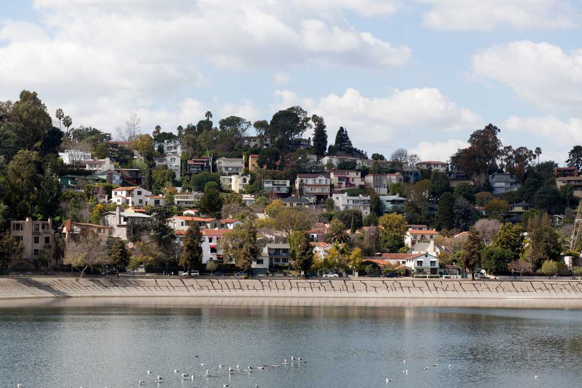 Houses on the west bank of the 1906 Silver Lake Reservoir, which gives the area its name