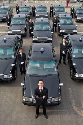 Nihon Kotsu drivers, with company president Ichiro Kawanabe at the front